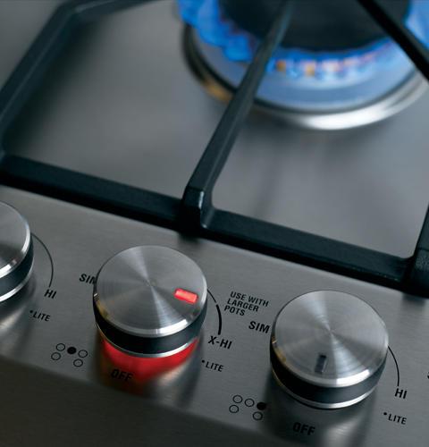 Hand-machined, stainless steel knob controls